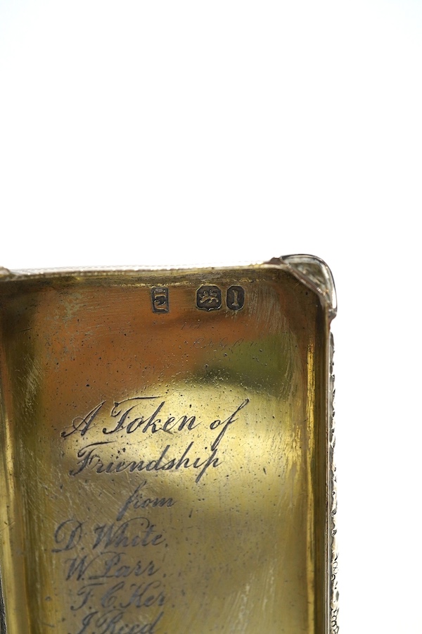 A George IV silver engine turned presentation snuff box, by John Jones III, London 1826, the cover decorated with a scene of deer, the interior with engraved inscription to Lieutenant Borthwick 12th Regiment, 10cm wide,